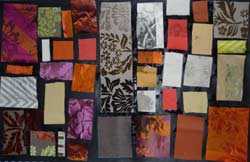 tableau composé de rectangles de tissus dans les tons d'orangés collés à la manière d'un tableau de Mondrian