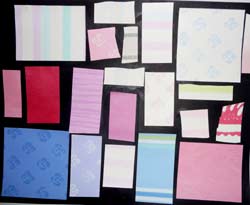 tableau composé de rectangles de papiers peints collés à la manière d'un tableau de Mondrian