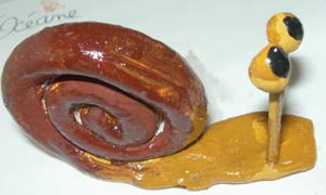 escargot en pâte à modeler durcissante
