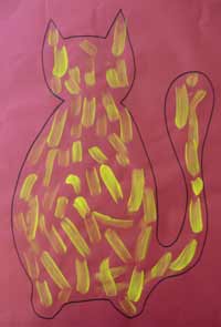 dessin de poils de chat dans une forme de chat par un enfant de petite section