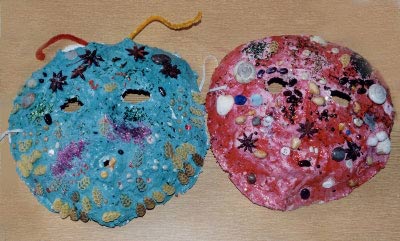 masques africains incrustés de perles en grande section de maternelle