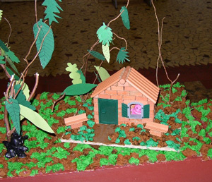 maquette des 3 petites cochones et une maison en brique