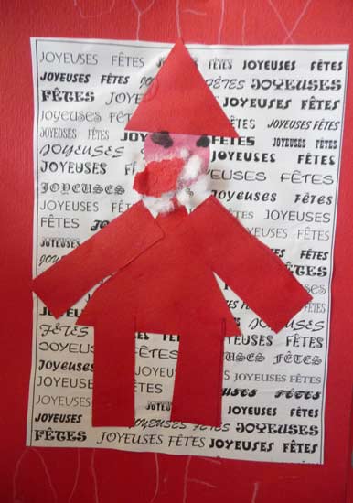 carte avec un père-noël composé de morceaux de papiers rouge