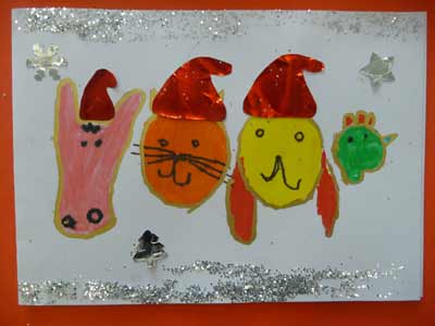 carte de Noël avec un âne, un chien, un chat et un coq