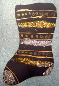 chaussette de noel noire aux feutres dorés