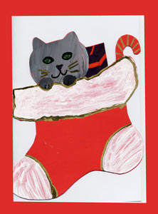 carte de Noël avec avec différents motifs en papier brillant rouge