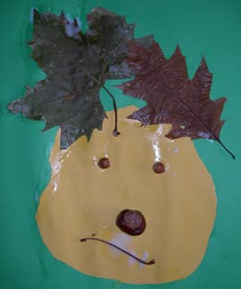 tête de bonhomme avce des feuilles pour cheveux