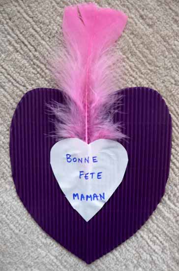 carte avec un coeur et une plume