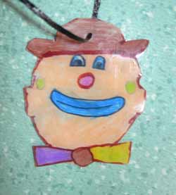 pendentifs avec des têtes de clown en plastique fou