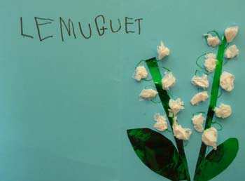 carte avec du muguet en papier